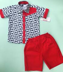 Enfant aux cheveux frisés au gingembre. 100 Idees De Tenues Pour Garcon Tenues Pour Garcon Tenue Africaine Pour Homme Mode Masculine Africaine