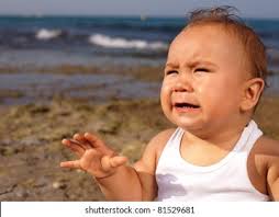 7+ Hundred Crying Baby Beach Royalty-Free Images, Stock Photos & Pictures