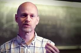 John Beacom, PhD, receives 2022 Distinguished Scholar Award