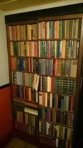 This funky bar is hidden away in a basement in the style of a speakeasy from america's prohibition era. Entrance To Basement Bar Via Bookcase Picture Of Panda Sons Edinburgh Tripadvisor