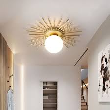We love this modern sunburst light fixture. Diy Sunburst Light Fixture Brooke Summers Photography