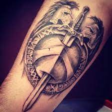 Large greek shield from trojan war. Shield Tattoo Meanings Itattoodesigns Com Shield Tattoo Spartan Tattoo Best Sleeve Tattoos