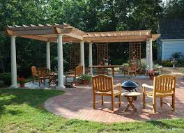 A Nice Example Of An L Shaped Pergola In Clear Cedar With Tapered Tuscan Columns Outdoor Pergola Pergola Plans Backyard Pergola