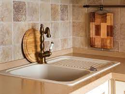 Even with a good sealer, it will still retain bits of food that hit it and will stain. Travertine Tile Backsplash Ideas Hgtv
