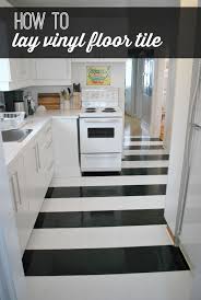 How To Lay Vinyl Black And White Flooring In Stripes The Sweetest Digs Black And White Flooring Kitchen Flooring Budget Flooring Ideas