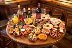 A contender for madrid's most photogenic tapas bar, its antique shopfront advertises quesos, fiambre, vinos—and that sums it up. Book Taxi Madrid Tapas In Madrid