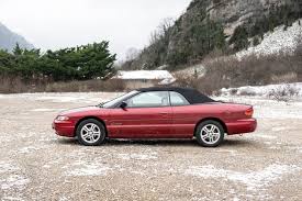 Image result for Dark Garnet Red 2001 Stratus