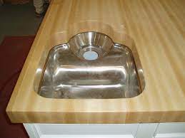 Undermount sinks are the most popular style of sinks we make cutouts for. Edge Grain Maple Wood Countertop Undermount Sink Cutout