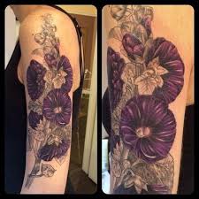 Hollyhock Tattoo Added Some Color To Rachel S Hollyhock Tattoo Today Next Session Yellow Rose Tattoos Tattoos Rose Tattoos