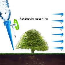 Son système d'irrigation automatique est une façon écologique. Goutte A Goutte Bouteille Irrigation Goutte A Goutte Bouteille Arrosage Goutte A Goutte Avec Vannes De
