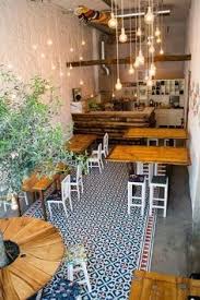 Industrial Decorating Ideas For Your Space In 2020 Cafe Interior Design Coffee Shop Interior Design Coffee Shop Decor