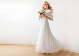 Long sleeve gowns are breathtaking, elegant and totally modern. Long Sleeve Ivory Floral Lace Bridal Gown With Open Back Blogdresses