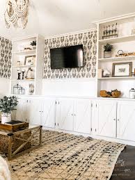 Video about floating tv shelf, shelves around tv on wall, decorating around a wall mounted tv, wall shelves design for living room. 12 Ideas To Decorate Around A Tv Bless Er House