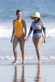 The curse of the black pearl', 'star trek', 'star trek into darkness' and 'avatar'. Zoe Saldana Wears A Bright Yellow Swimsuit While Enjoying A Beach Day With Marco Perego In Malibu California 060920 17