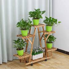 Mar 16, 2021 · to help you pick the right outdoor plant pot for your needs, we've broken down some of the pros and cons of the most typical materials on offer. Wooden Plant Stand Indoor Outdoor Patio Garden Planter Flower Pot Stand Shelf