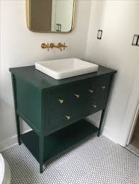 It is illuminated by recessed lights fitted on the regular white ceiling. Custom Made Hunter Green Vanity Green Vanity Green Bathroom Furniture Bathroom Design Decor