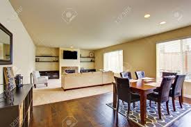 The first thing to considerchoosing a carpet for the dining area of the dining room, the size of the room. Spacious Dining Area With Wooden Table Set Connected To Living Room With Fireplace And Carpet Floor Northwest Usa Stock Photo Picture And Royalty Free Image Image 61648371