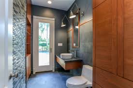 A contemporary grey bathroom clad with large scale tiles, with a small window and black fixtures to make it look bolder. Grey Brown Bathroom Ideas Houzz