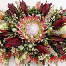 Our Kind Of Flower Power Protea Weddinginspiration Flowerpower Humpday Casket Flowers Australian Native Flowers Flower Arrangements Center Pieces