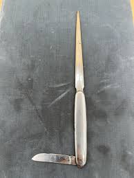 VINTAGE ADVERTISING LETTER OPENER