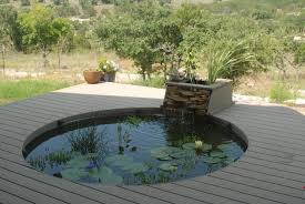 Modern Small Pond Round Shape With Koi Fish Koi Pond Design Pond Design Minimalist Garden