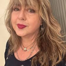 Me looking at our 12 sewing machines 😅