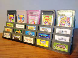 Does such a thing like this exist outside of whatever nintendo or other manufacturers used to create their cartridges? Gba Cartridge Display Tower For Nintendo Gameboy Advance Etsy In 2021 Trading Card Store Retro Games Room Gameboy