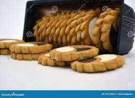 Delicious Sandy Sweet Cookies with Sharp Edges and Chocolate and White  Filler Invested in Brown Brown Packaging. Stock Photo - Image of city,  chocolate: 212178934