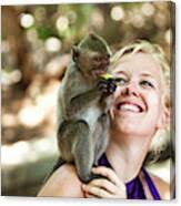 A Woman Smiling As A Monkey Eats Photograph by Patrick Orton