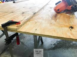 The most common plywood table material is wood & nut. Diy Folding Table How To Make An Inexpensive Diy Game Poker Table The Diy Nuts