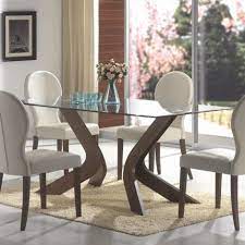 This modern black dining room table provides a wide variety of features. Furniture Wood Table Bases With Modern Model You Can See Plus Rugs Under There Wood Table Bases For Glass Tops Glass Dining Room Table Dining Room Sets