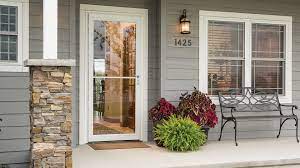 A storm screen door can come with panels of glass and screen which are interchangeable as the seasons change. Pella Rolscreen 36 In X 81 In White Full View Aluminum Storm Door In The Storm Doors Department At Lowes Com