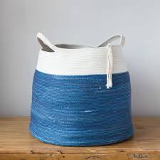 One method for creating rope baskets uses embroidery thread to sew the pieces of rope together. Cotton Rope Floor Basket Swans Island Company