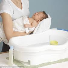 Before giving your baby her first tub bath, wait until her umbilical cord falls off, which usually happens ten to 14 days after birth. New Mothers Put Off Bathing Their Newborns After Birth In New Trend Daily Mail Online