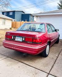 Image result for Light Beige 1990 Tracer