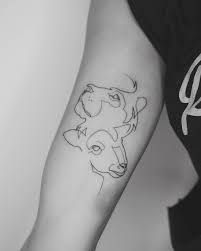Sometimes, this kind of tattoo is mistakenly seen as wings of a bird. Lion Lamb For Lisa Thanks For Coming Fineline Finelinetattoo Qttr Tattoo Btattooing Blackworkers Lamb Tattoo Lion And Lamb Bible Tattoos