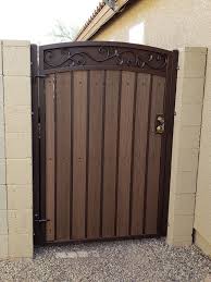 used normal wear we offer our services any kind of gate and fence this gate has custom metal double arch iron gate design iron garden gates metal gate door