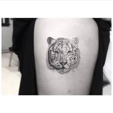 Tiger tattoo designs and ideas for men and women. Little Tattoos Fine Line Tiger Tattoo On The Right Upper Arm