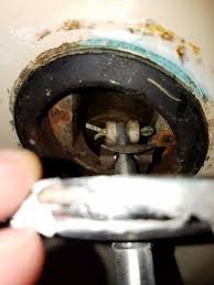 The cover plate protecting your tub's overflow drain may need to be removed occasionally, either for esthetic reasons — they can become unsightly and corroded over time — or so you can check for leaks. Replacing Bathtub Drain Lever No Screw Holes Screws Rusted Off Doityourself Com Community Forums
