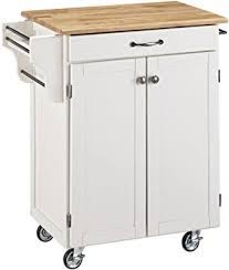 A storage drawer a slide out basket 2 pull out trays and an open shelf of this kitchen cart provides ample space for supplies and accessories. Amazon Com Create A Cart White Kitchen Cart With Wood Top With Home Styles Kitchen Islands Carts