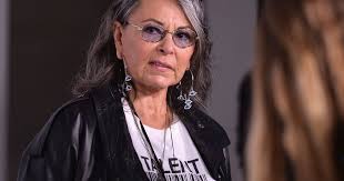 Roseanne Barr faces backlash after voicing support for Trump conspiracy  theory