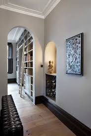 Make A Floor Area Look Bigger Painting Skirting Boards In Dark Shades Or Black Will Make The Floor Area Look Greater Than Skirt Home Modern Hallway Modern Hall