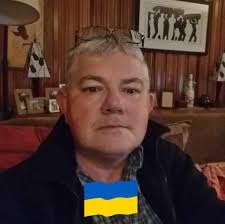 Why do Tamiya scale model kits have different colored boxes?