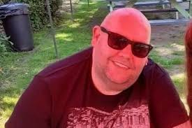 Jack Dreher spots himself in the Manchester Evening News celebrating VE Day  in Harpurhey