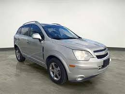 Image result for Silver Topaz 2013 Captiva