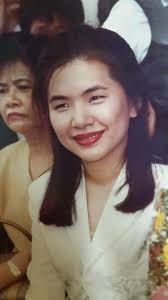 同学们，你们记得照片里的人是谁吗？