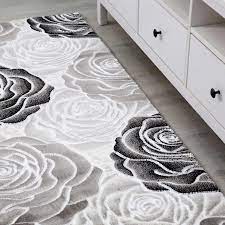 Krankheiten bei stockrosen zeigen sich auf den blättern der stockrose gelbe flecken, ist sie sehr wahrscheinlich von malvenrost befallen. Moderner Wohnzimmer Teppich Rosen Muster In Schwarz Grau Creme Vimoda Homestyle