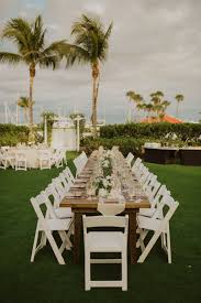 Tropical Inspired Waterfront Sarasota Destination Wedding Longboat Key Club Beachfront Weddings Palm Trees Wedding Wedding Reception Chairs