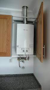 With its sleek modern design, it is perfectly suited to installation anywhere in your home, including in a kitchen where it has been designed to slide neatly under a standard kitchen work top. Pin By Wanda Van Den Berg On Kitchens Planning Ideas Small Toilet Room Boiler Cover Ideas Cupboard