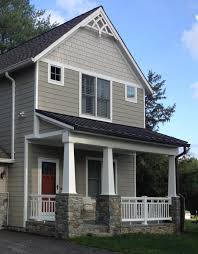 Think muted earth tones, including green, brown, and taupe shades. The Craftsman Panel The Porch Company